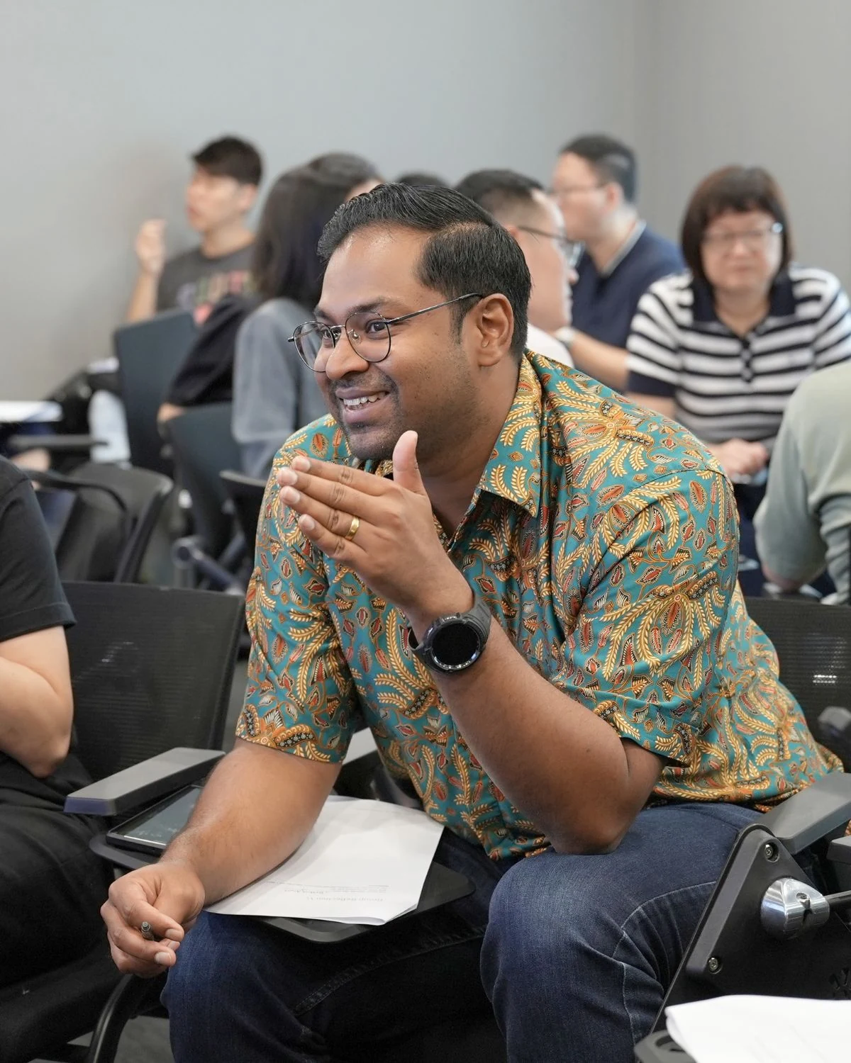 An Affinity Group advisor engaging in conversation at a seminar